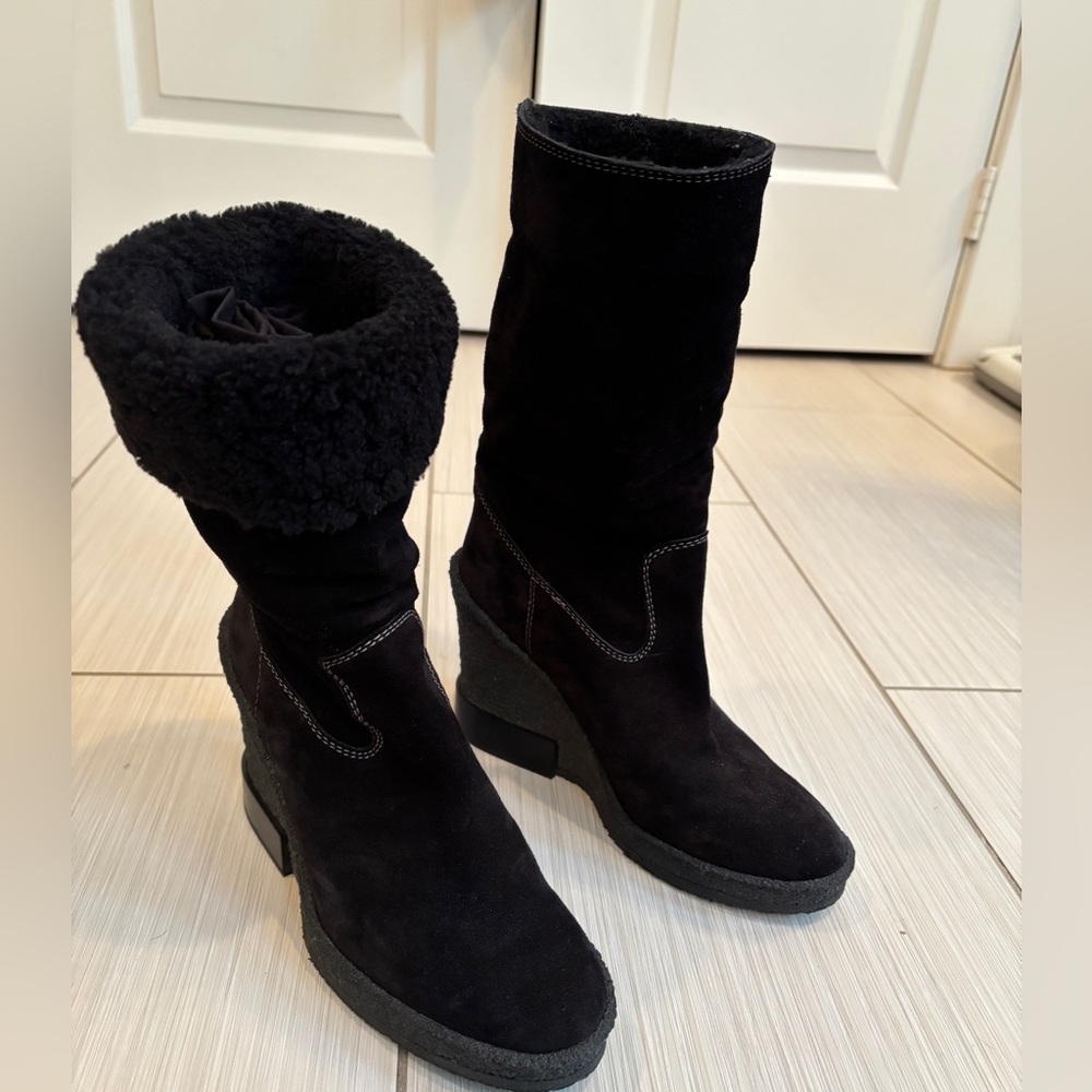Black Suede wedge heel boot with shearling lining.
